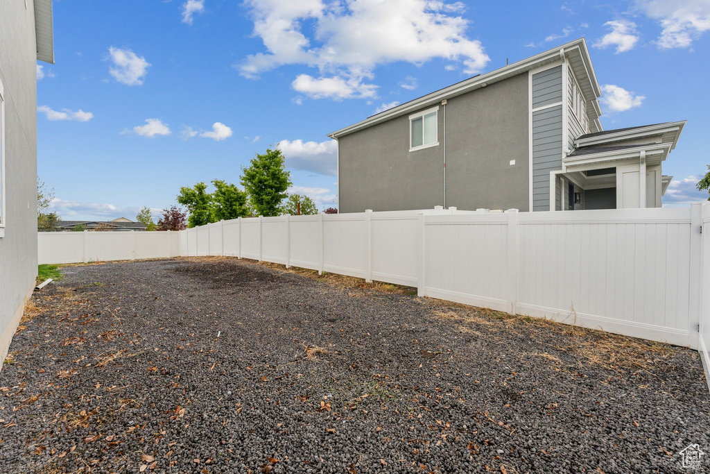 View of yard featuring a fenced backyard