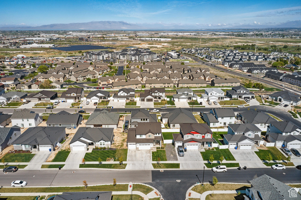 Drone / aerial view featuring a residential view and a mountain view