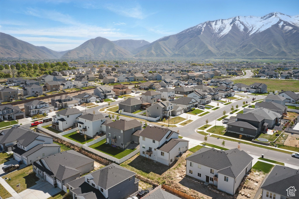 Aerial view featuring a mountain view and a residential view
