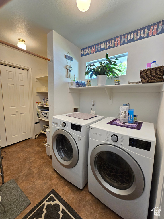 Laundry room with independent washer and dryer and laundry area