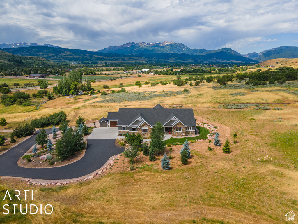 Drone / aerial view with a rural view and a mountain view
