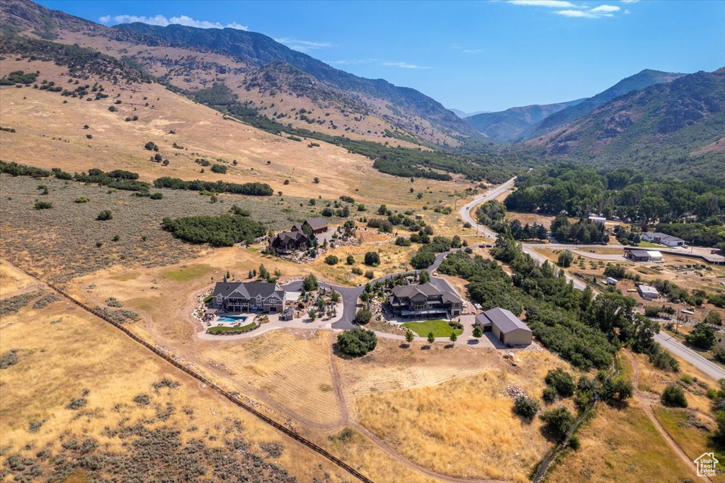 Drone / aerial view featuring a mountain view and a rural view