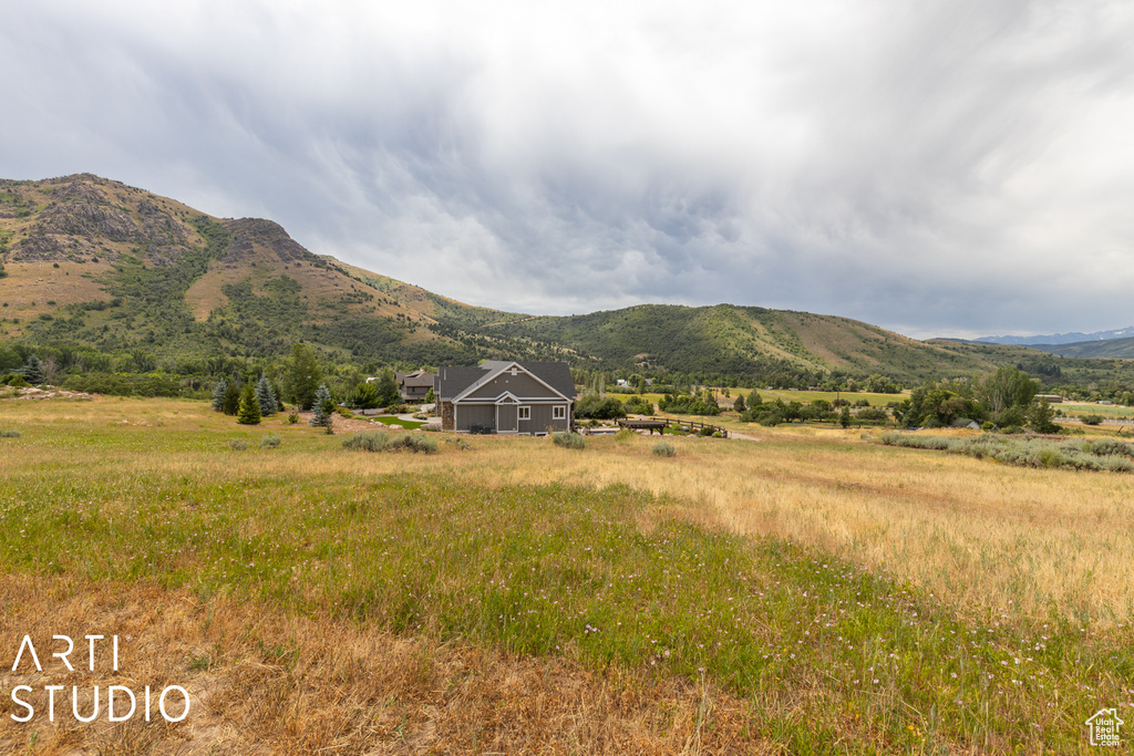 Property view of mountains featuring a rural view