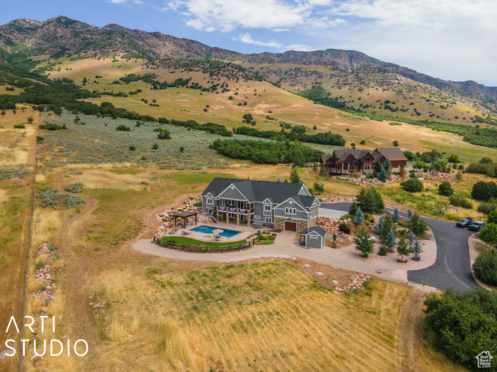 Aerial view with a mountain view and a rural view