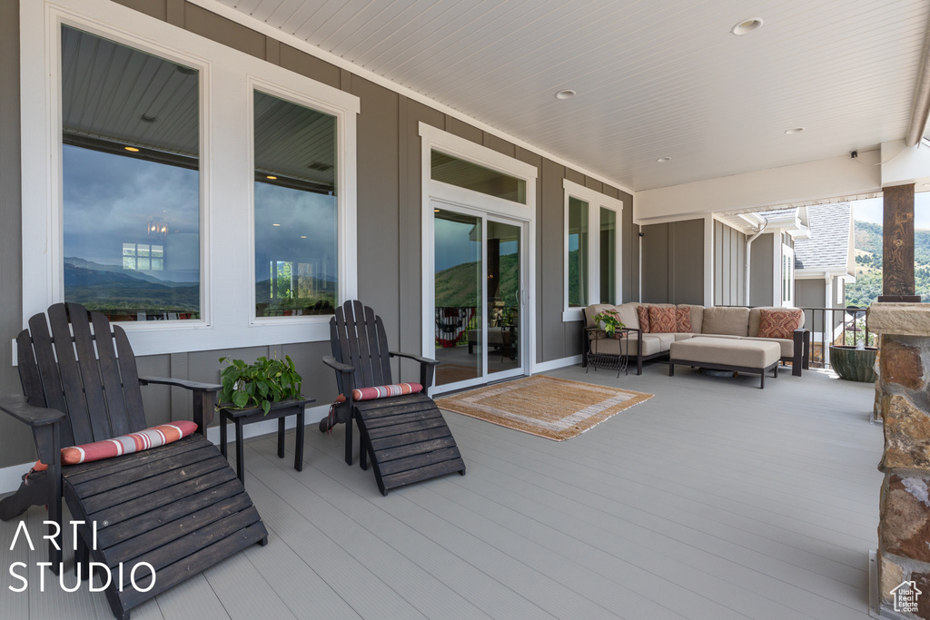 View of patio / terrace featuring outdoor lounge area and a deck