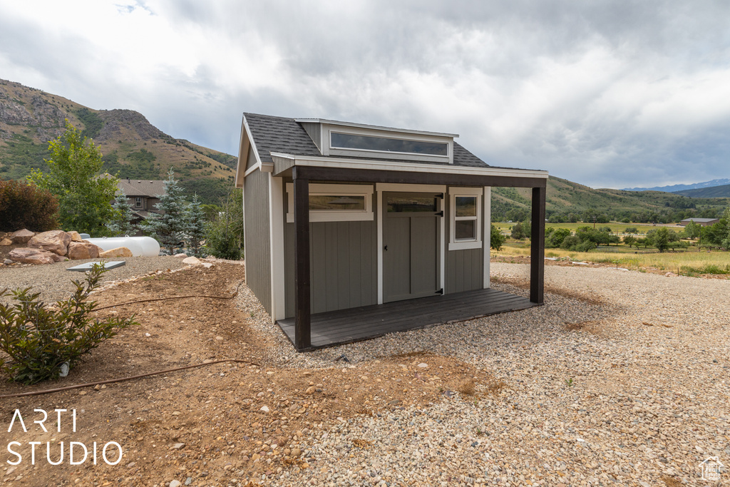 View of outdoor structure featuring a mountain view