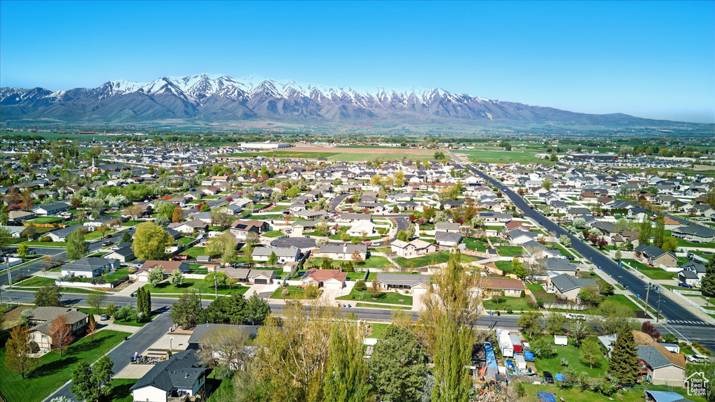 Drone / aerial view featuring a residential view and a mountain view