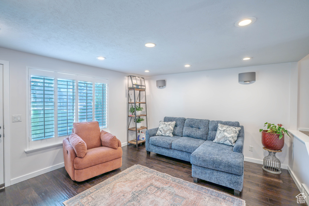 Living room featuring baseboards and wood finished floors