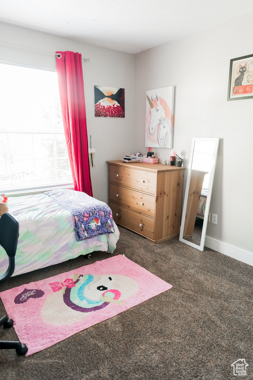 Bedroom featuring carpet floors