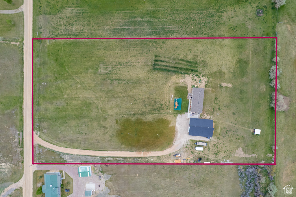 Aerial view of property and surrounding area with property boundaries highlighted