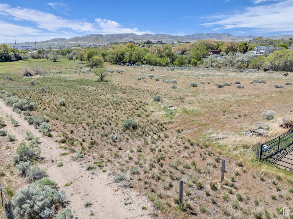 Property view of mountains featuring a rural view