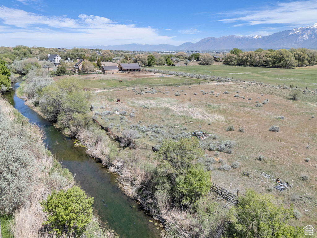 Birds eye view of property featuring a rural view and a mountain view