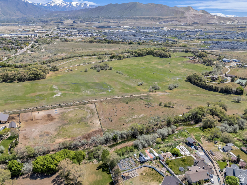 Birds eye view of property with a mountain view