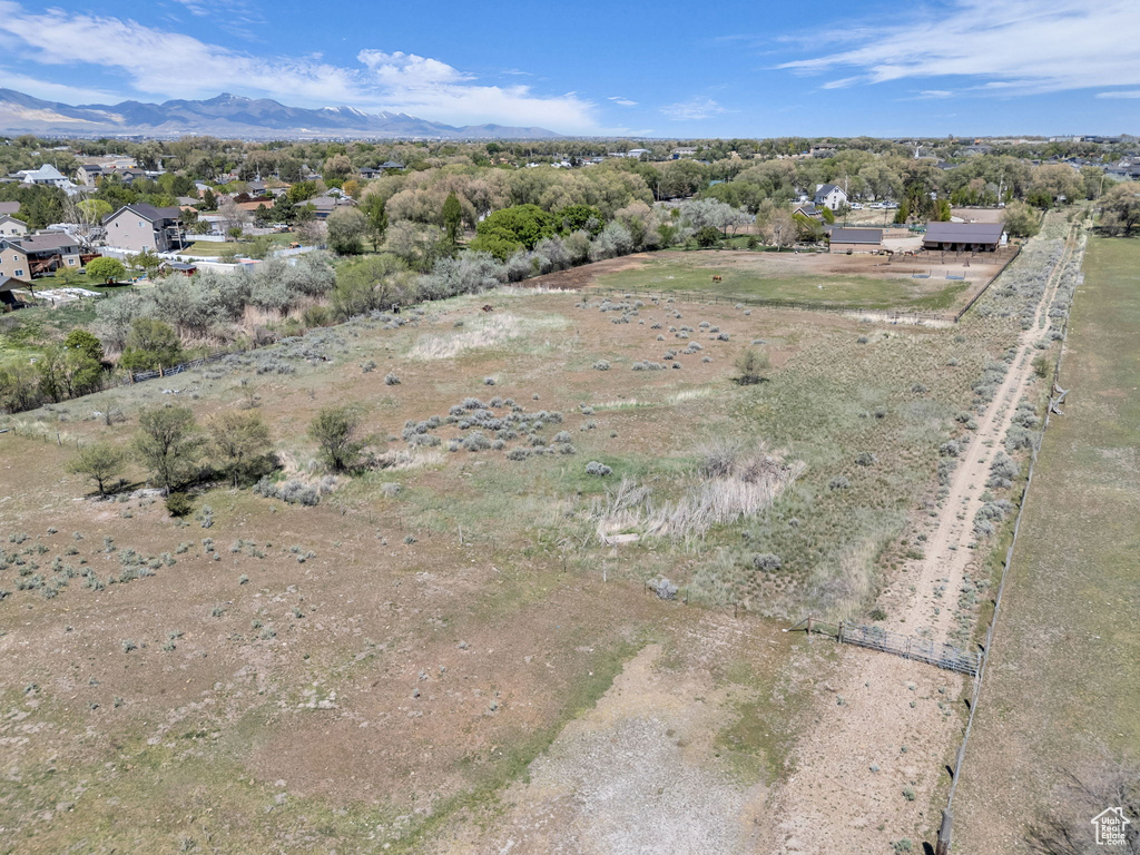 Birds eye view of property featuring a residential view and a mountain view
