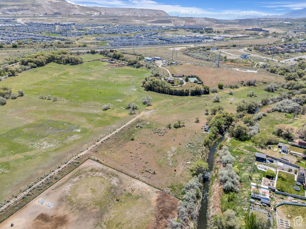 Aerial view featuring a rural view and a mountain view