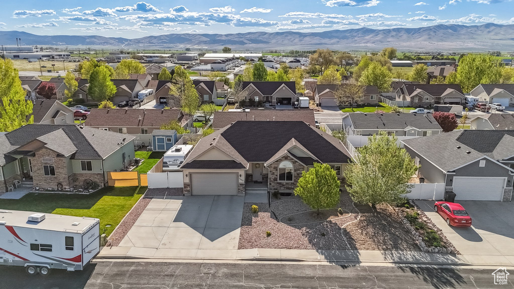 Drone / aerial view featuring a residential view and a mountain view