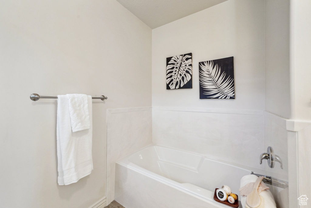 Full bathroom featuring a garden tub