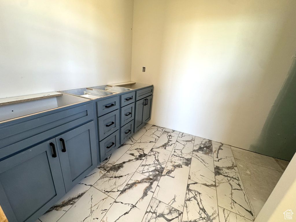 Bathroom with marble finish floor