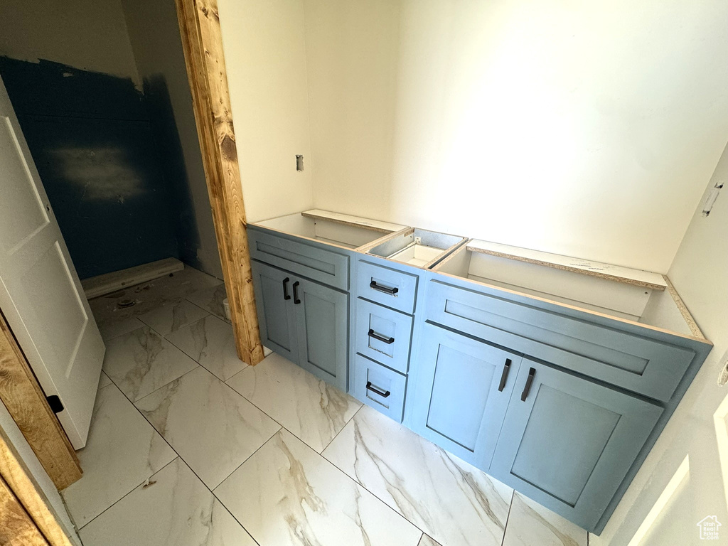 Bathroom with marble finish floor