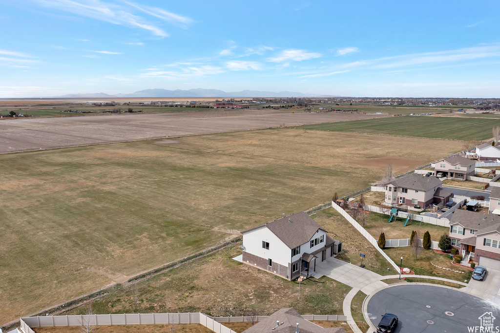 Drone / aerial view with a mountain view and a rural view