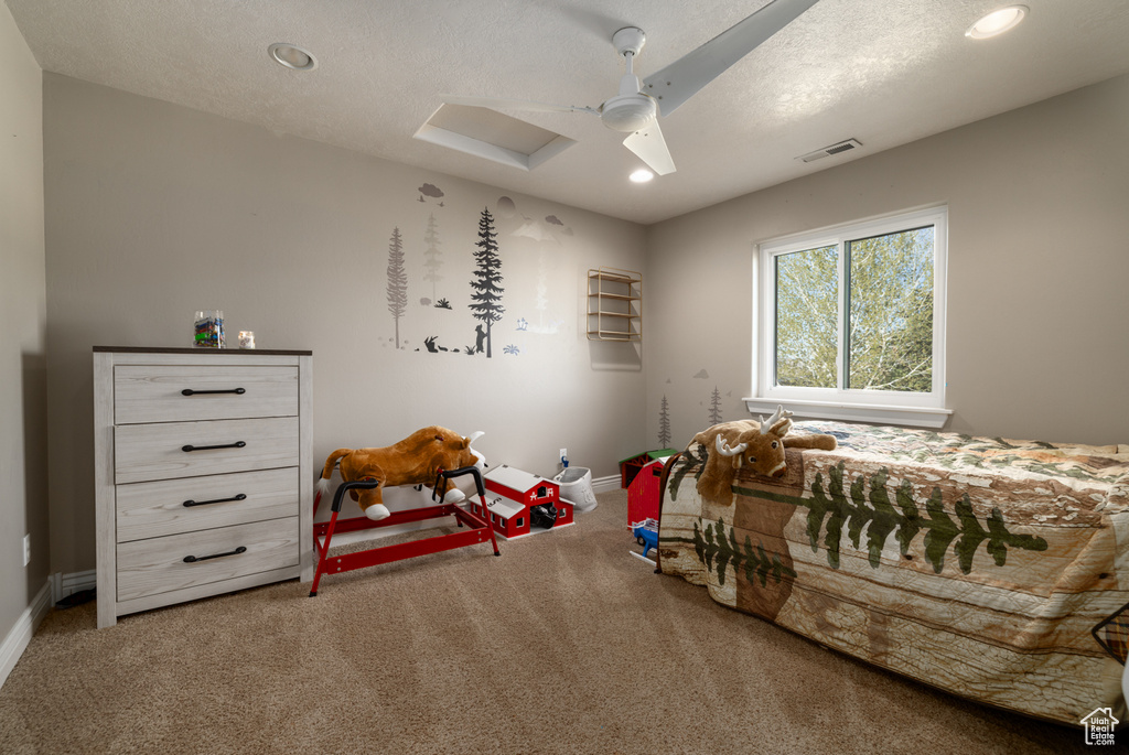 Carpeted bedroom with recessed lighting, baseboards, visible vents, and ceiling fan