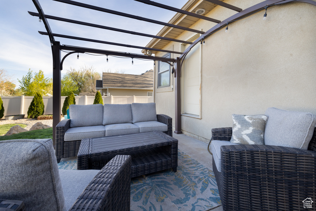 View of patio / terrace with a pergola and an outdoor living space