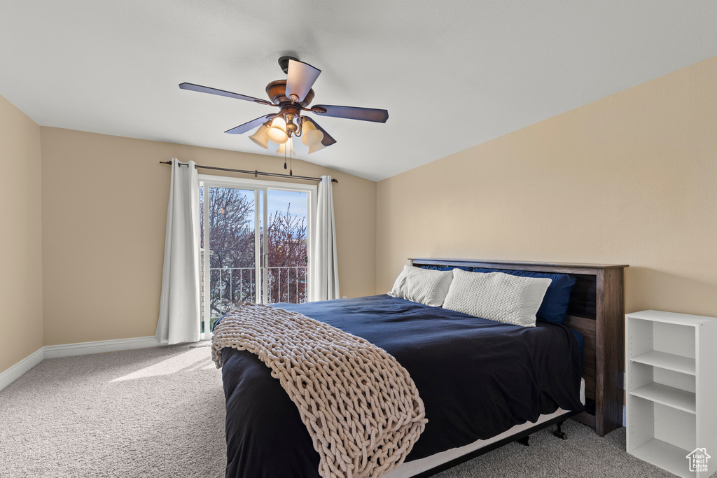 Bedroom featuring baseboards, carpet flooring, and ceiling fan