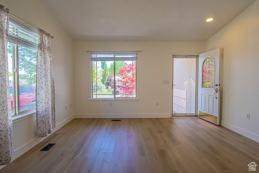 Spare room featuring recessed lighting, baseboards, visible vents, and wood finished floors
