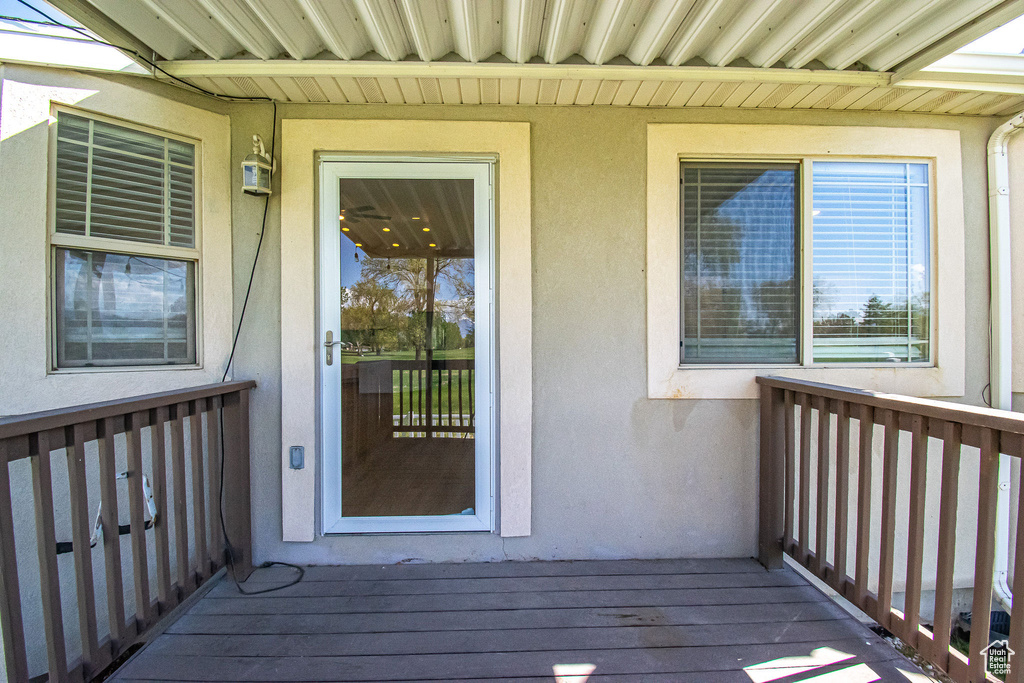 Entrance to property featuring stucco siding