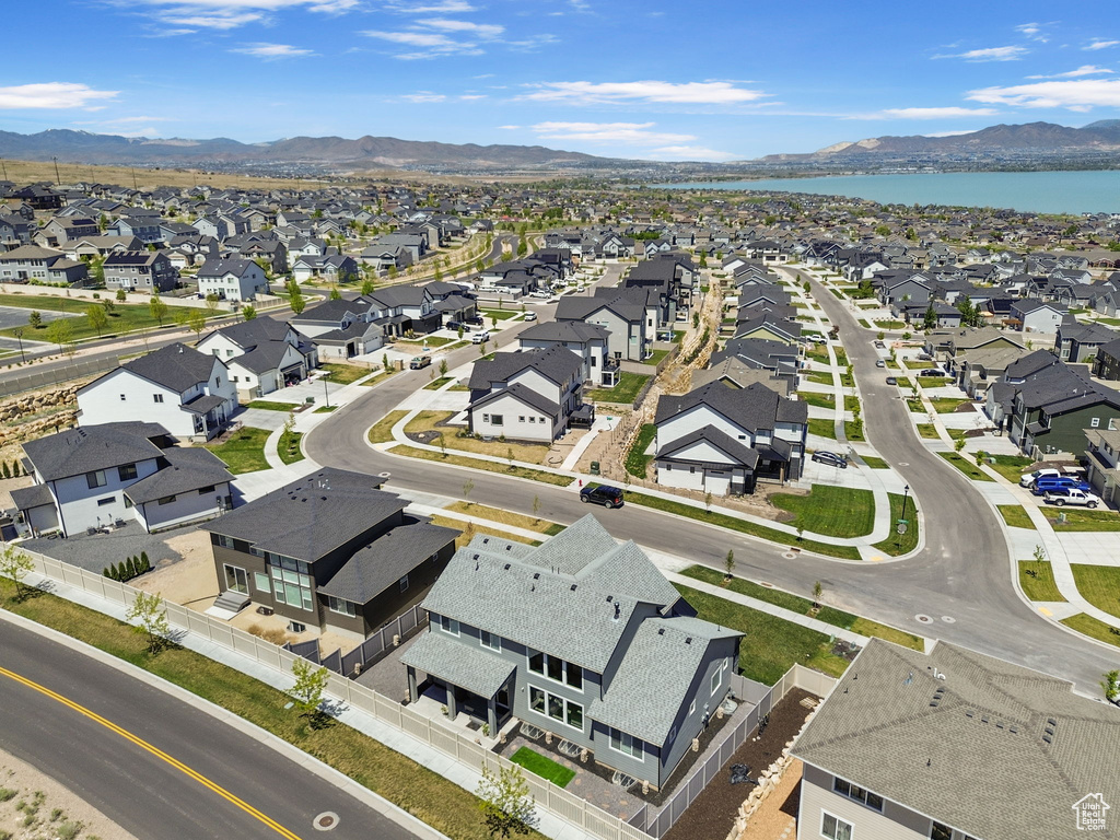 Aerial view featuring a residential view and a water and mountain view