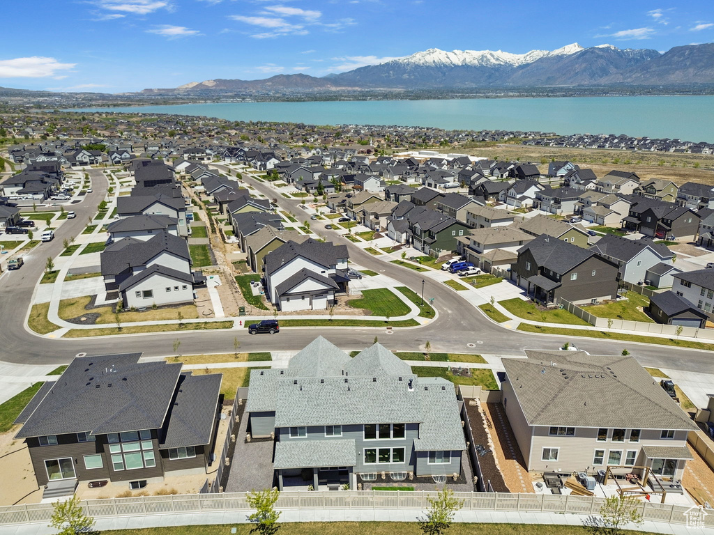 Drone / aerial view featuring a residential view and a water and mountain view