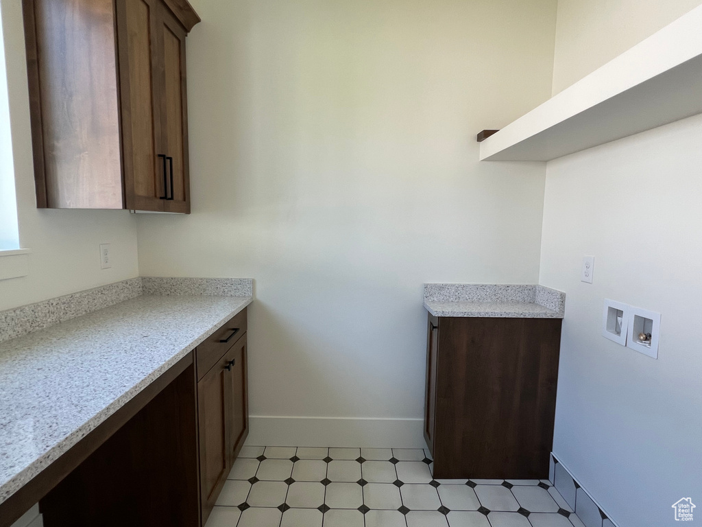 Laundry room with cabinet space and washer hookup
