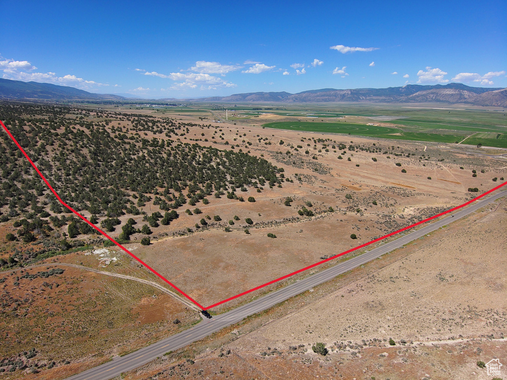 Aerial view with a mountain view, a rural view, and view of desert