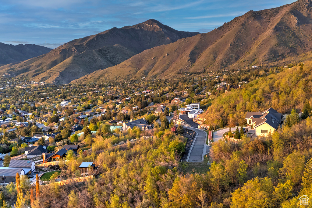 Property view of mountains with a residential view
