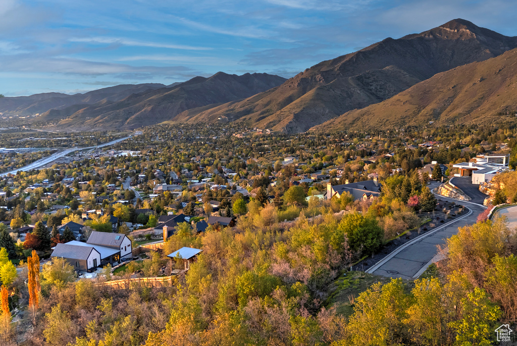 Birds eye view of property featuring a mountain view and a residential view