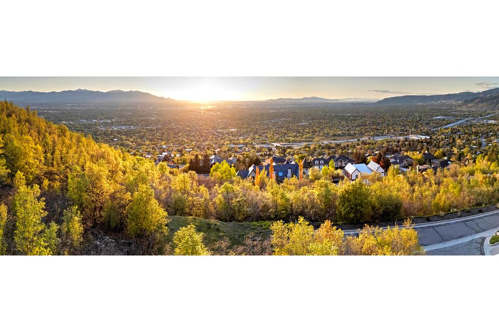 Property view of mountains with a residential view