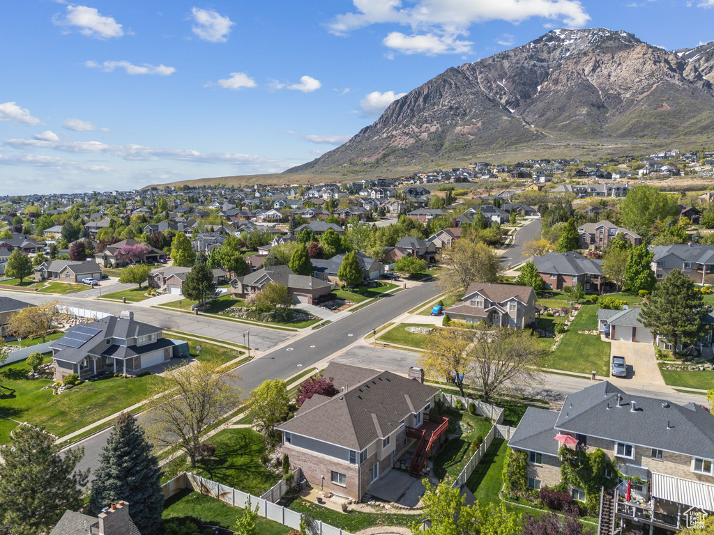 Birds eye view of property featuring a mountain view and a residential view