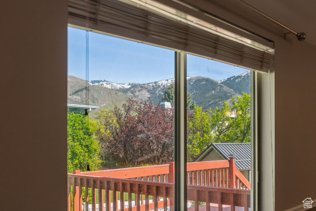 Doorway with a healthy amount of sunlight and a mountain view