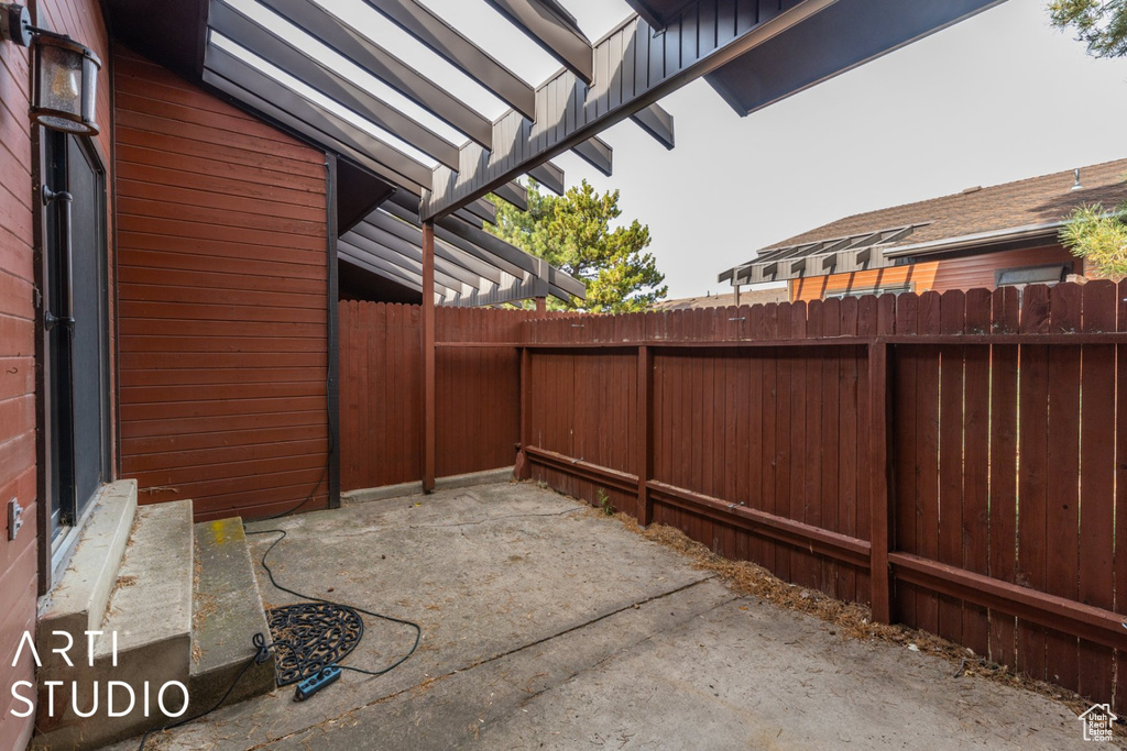 View of patio featuring a fenced backyard