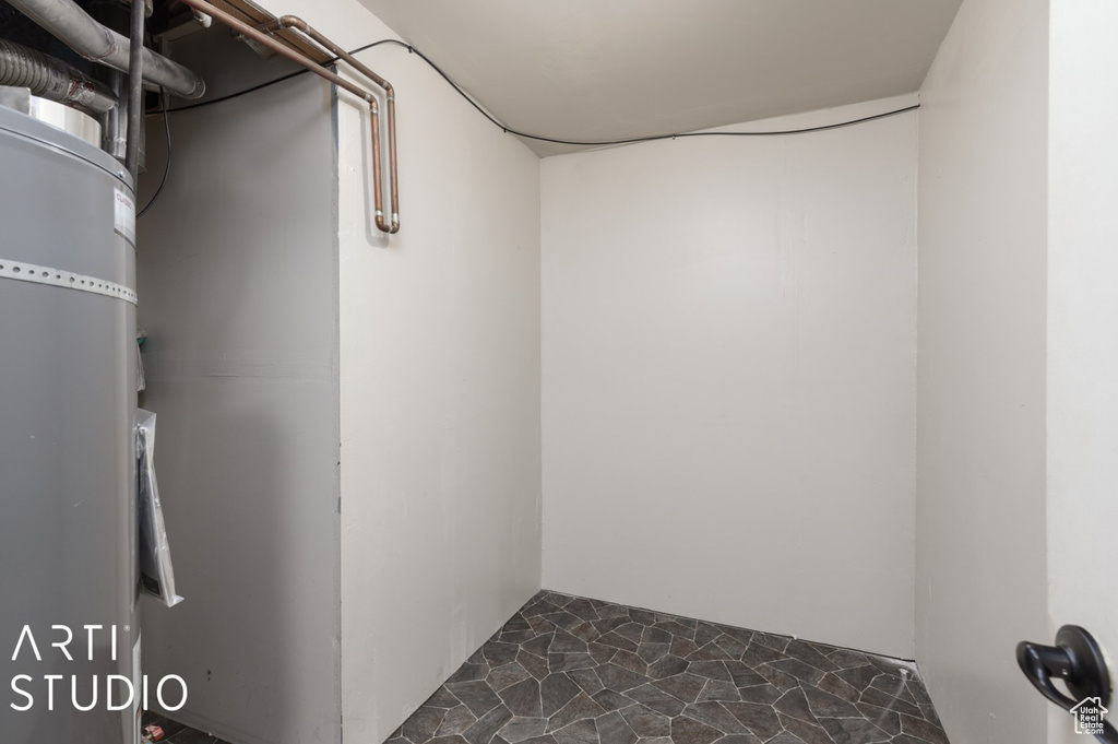 Below grade area with stone finish floor