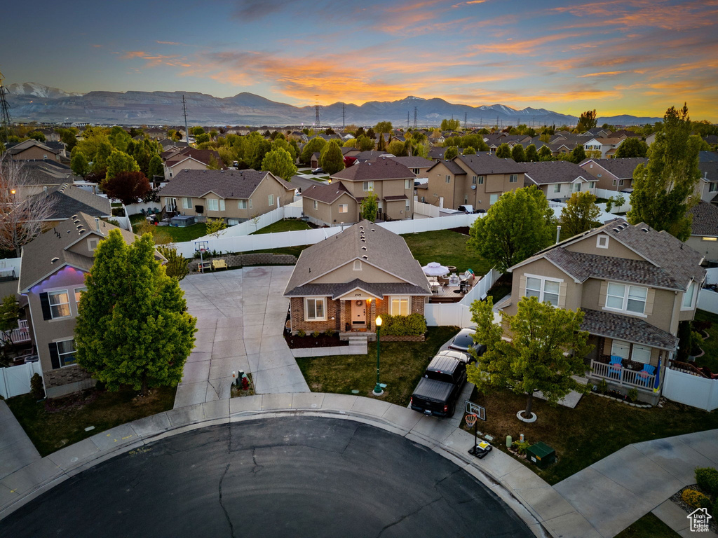 Aerial view at dusk with a mountain view and a residential view