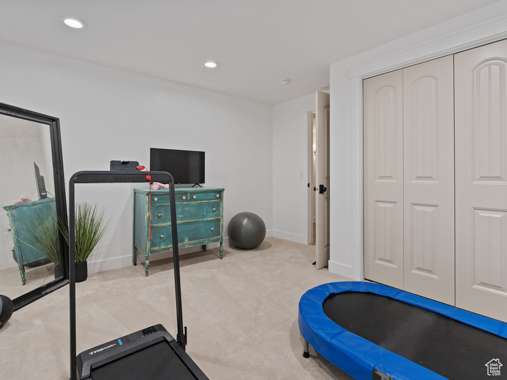 Workout room featuring baseboards, carpet flooring, and recessed lighting