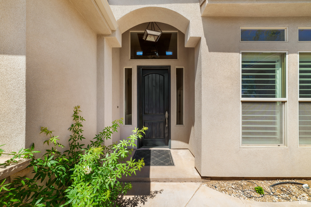Property entrance with stucco siding