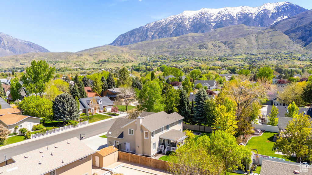 Drone / aerial view with a mountain view and a residential view