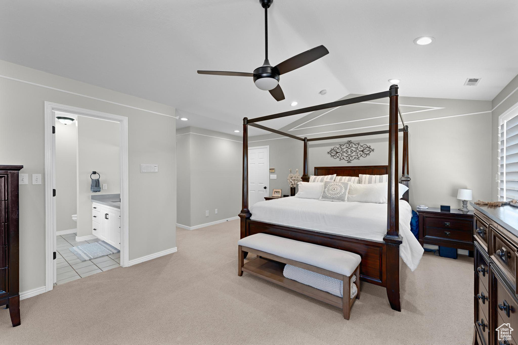 Bedroom featuring visible vents, light carpet, recessed lighting, and lofted ceiling