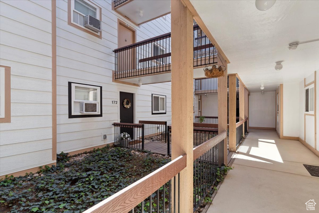 Doorway to property with a balcony
