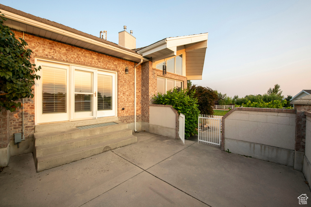 View of patio / terrace featuring a gate and fence