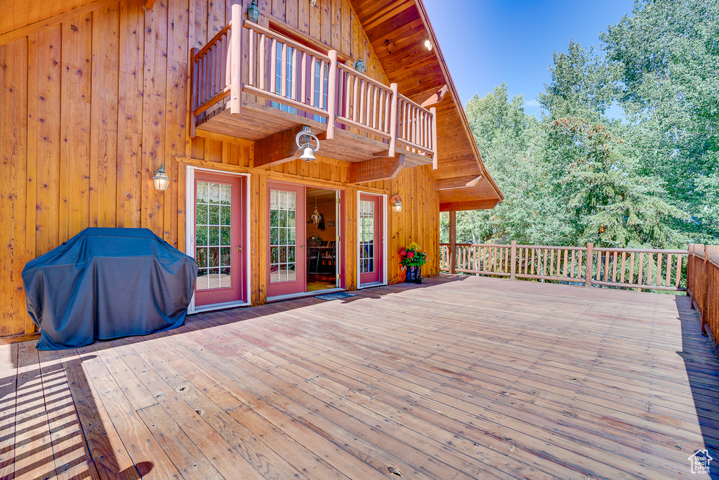 Wooden deck featuring grilling area