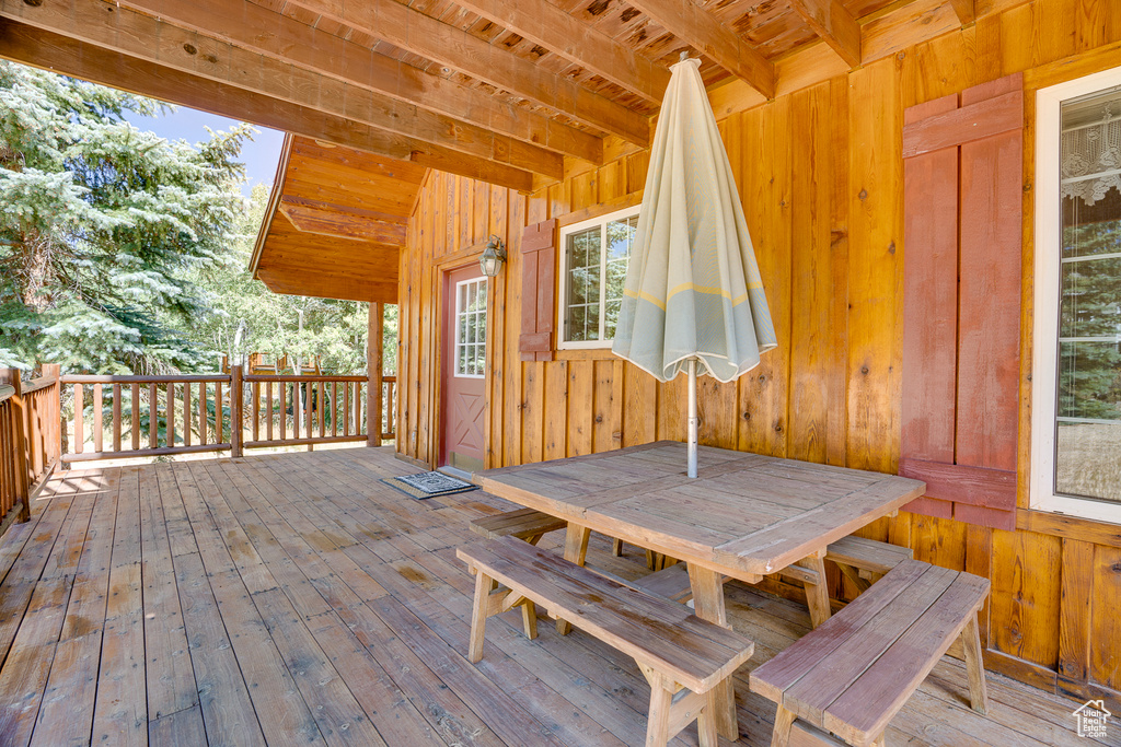 Wooden deck with outdoor dining area