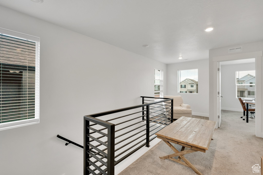 Staircase with baseboards, carpet flooring, visible vents, and recessed lighting